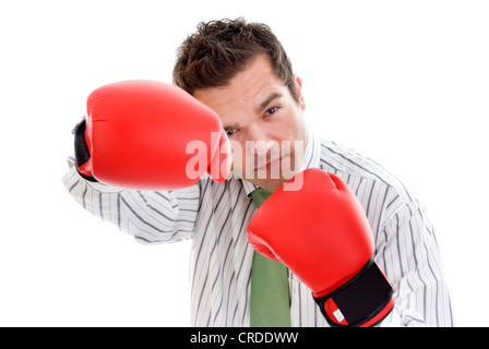 young businesmann with boxing gloves Stock Photo