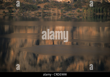 Reflections on Euphrates river at dawn Halfeti village Sanliurfa Province southeast Turkey Stock Photo