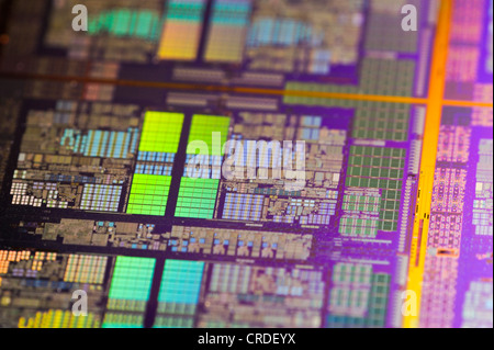 Computer chips side by side on a wafer Stock Photo