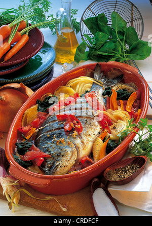 Bream with vegetables, Spain. Stock Photo