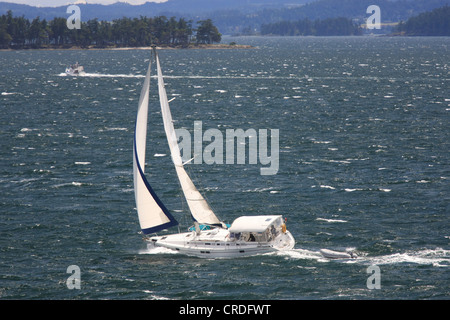Sailboat in Swanson Channel west of Pender Island, BC, Canada Stock Photo