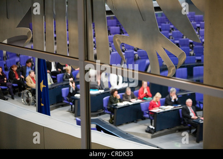 Parliamentary session in the Plenary Assembly Hall of the Reichstag building, part of the German federal eagle is in the Stock Photo