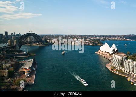 Sydney Cove, with the Opera House and Sydney Harbour Bridge in the harbour, Sydney, New South Wales, Australia Stock Photo