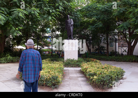 Man looking at Simon Bolivar statue in Havana, Cuba. Stock Photo