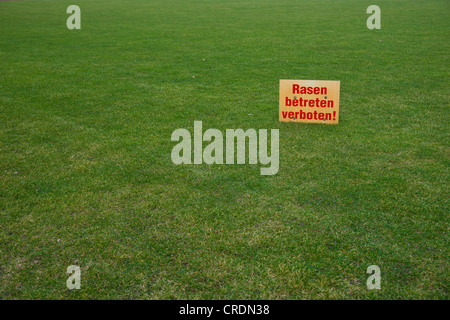 Sign in German, Rasen betreten verboten, Keep off the lawn Stock Photo
