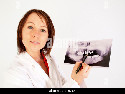 dentist wirh tooth x-ray Stock Photo