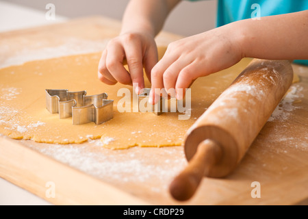 Baking Christmas cookies Stock Photo