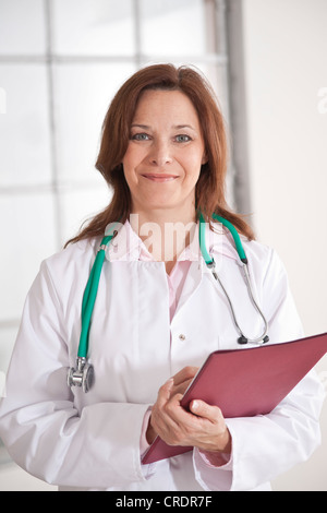 Portrait of a smiling female doctor Stock Photo