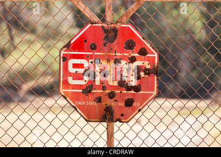 Stop Sign with bullet holes Stock Photo - Alamy