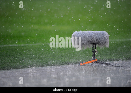 outdoor micro in rain, football stadion Stock Photo