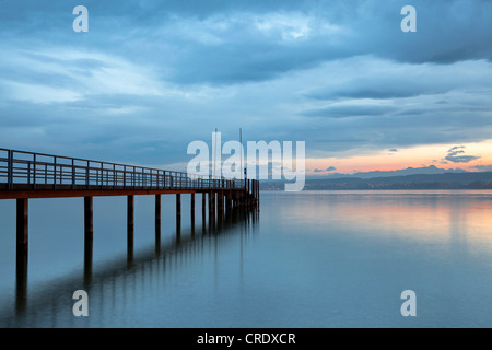 Evening mood with clouds at the jetty near the thermal spring in Konstanz, Lake Constance, Baden-Wuerttemberg, PublicGround Stock Photo