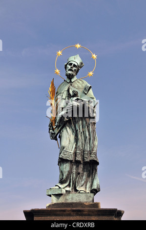 Statue of St. John of Nepomuk, Charles Bridge on the Vltava River, a UNESCO World Heritage site, Prague, Czech Republic, Europe Stock Photo