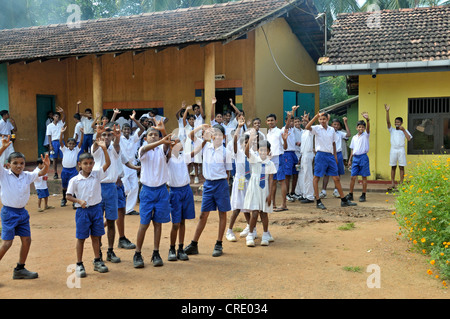 Schoolchildren using sign language, School for the Deaf, Beliatta, Sri Lanka, South Asia, Asia Stock Photo