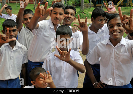 Schoolchildren using sign language, School for the Deaf, Beliatta, Sri Lanka, South Asia, Asia Stock Photo