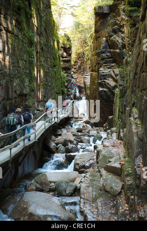Walkway through The Flume Gorge, a narrow gorge between rocks, Franconia Notch State Park, White Mountains National Forest Stock Photo