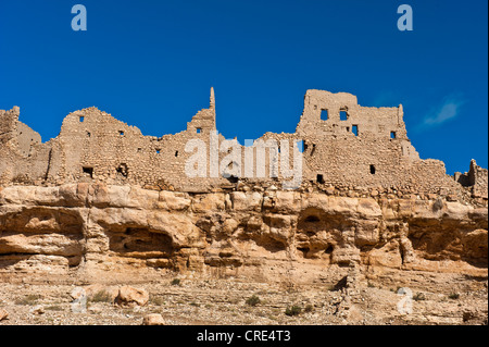 Ruins of an abandoned village on a cliff, Ksar Meski, Ziz Valley, southern Morocco, Morocco, Africa Stock Photo