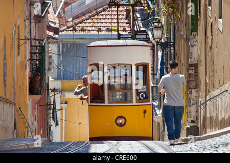 Tram of the Elevador da Bica funicular railway in the district of Bairro Alto, Lisbon, Portugal, Europe Stock Photo