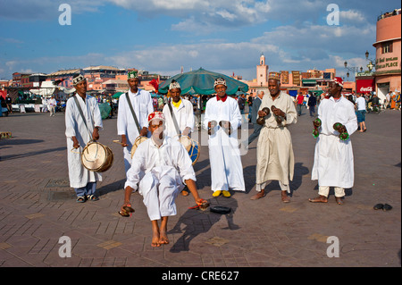Gnaoua musicians performing traditional dances and music on the Jemaa el-Fnaa square, Marrakech, Morocco, Africa Stock Photo