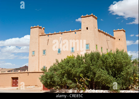 Newly built Kasbah, built of rammed earth, Tighremt or stronghold of the Berber, Ouarzazate, Lower Dades Valley, Kasbah Road Stock Photo
