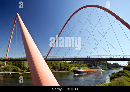 the red steel arch bridge over the Rhine-Herne-Channel at the Nordstern Park, Germany, North Rhine-Westphalia, Ruhr Area, Gelsenkirchen Stock Photo