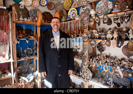 Berber in his gift shop, Tizi-n-Test mountain pass road, in the High Atlas Mountains near Asni, Morocco, Africa Stock Photo