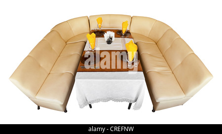 Comfortable leather beige sofa and a table in a restaurant Stock Photo