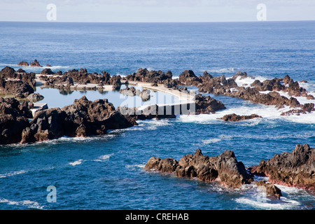 Sea water pool surrounded by lava rocks in the Atlantic, in Porto Moniz, Madeira, Portugal, Europe Stock Photo