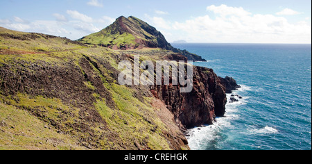 Lava rock cliffs on the Atlantic coast, peninsular and nature reserve Ponta de São Lourenço, in , Portugal, Europe Stock Photo
