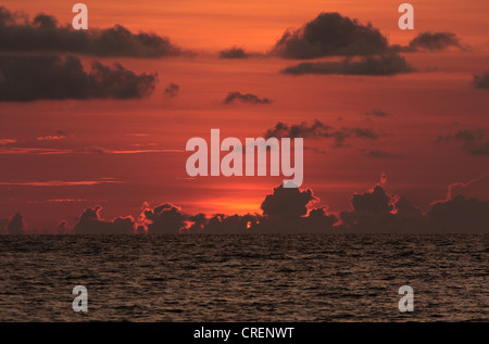sunset with clouds over the sea at Nai Yang Beach, Thailand, Phuket, Andaman Sea Stock Photo