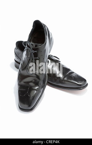 A pair of mens lace-up black shoes Stock Photo