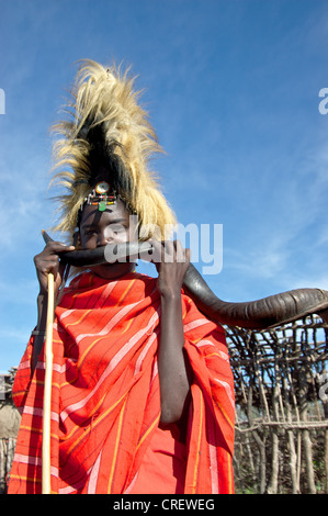 Portrait of a boy playing traditional music at the wedding, Masai Mara, Kenya. Stock Photo