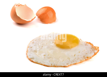 Fried egg and egg shell isolated on white Stock Photo