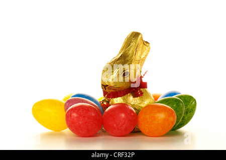 chocolate Easter bunny with coloured  Easter eggs Stock Photo