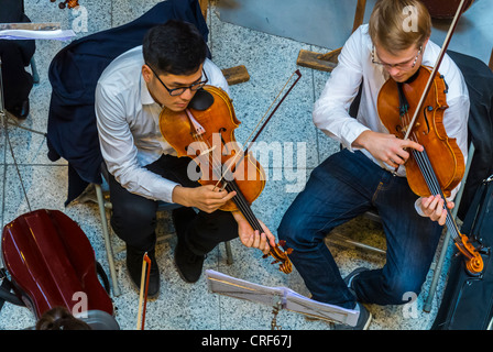 World Music Day, Paris, France, Aerial View, Male Classical Musicians Performing in French Train Station 'Gare S-aint Lazare', National Music Festival, 'Fete de la Musique', Classical Music Concert, integrated Stock Photo
