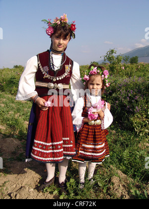 girls in traditional clothes at the rose festival of Karlovo, Bulgaria, Karlovo Stock Photo