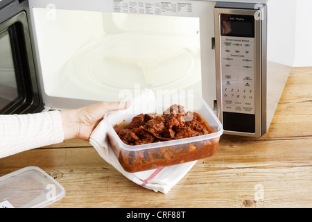 Heating Food In A Microwave Oven Stock Photo, Picture and Royalty Free  Image. Image 178439242.