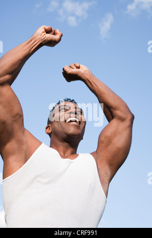 Cheerful African American bodybuilder celebrating success Stock Photo