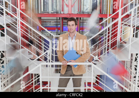 Time lapse of business people on stairs Stock Photo
