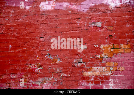 Painted Brick Wall With Paint Peeling Off Stock Photo