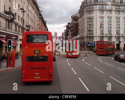 Double Decker buses on Oxford Street, London, England, May 14, 2012, © Katharine Andriotis Stock Photo