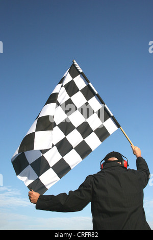 man with checkered flag Stock Photo