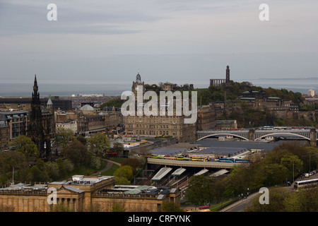 View of city from Edinburgh Castle. One can see the skyline, Waverley Railway station, Balmoral Hotel and others. Stock Photo