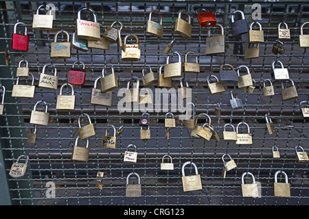 padlocks as love symbol at Hohenzollernbruecke, Germany, North Rhine-Westphalia, Cologne Stock Photo