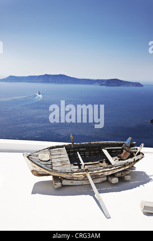 Weathered wooden boat on balcony Stock Photo