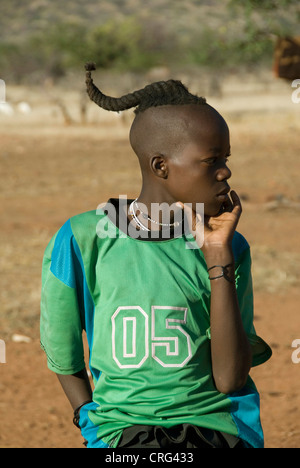 young Himba boy, Kaokoveld, Namibia Stock Photo