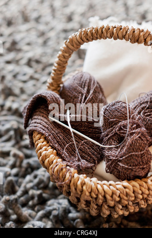Close up of yarn in knitting basket Stock Photo