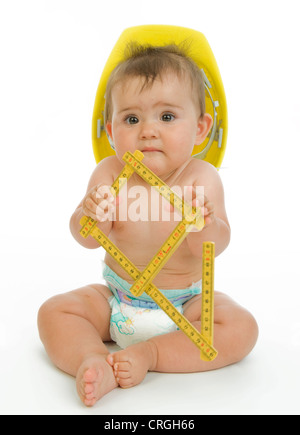 little child with diaper as building worker Stock Photo