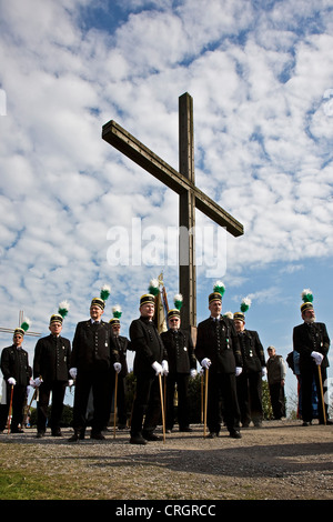 pit men in traditional clothing at stockpile Haniel on a crossroad, Germany, North Rhine-Westphalia, Bottrop Stock Photo