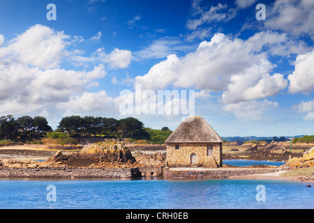 The Moulin de Berlot, an old tide mill on the Ile de Brehat, off the coast of Brittany, France. Stock Photo