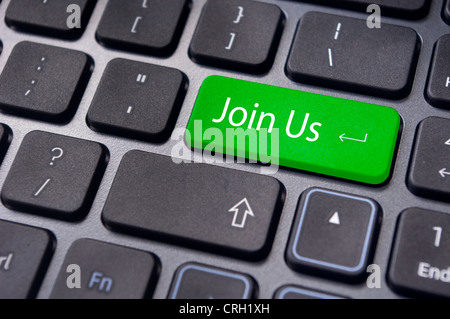 online communities concept, with 'join us' on computer keyboard. Stock Photo